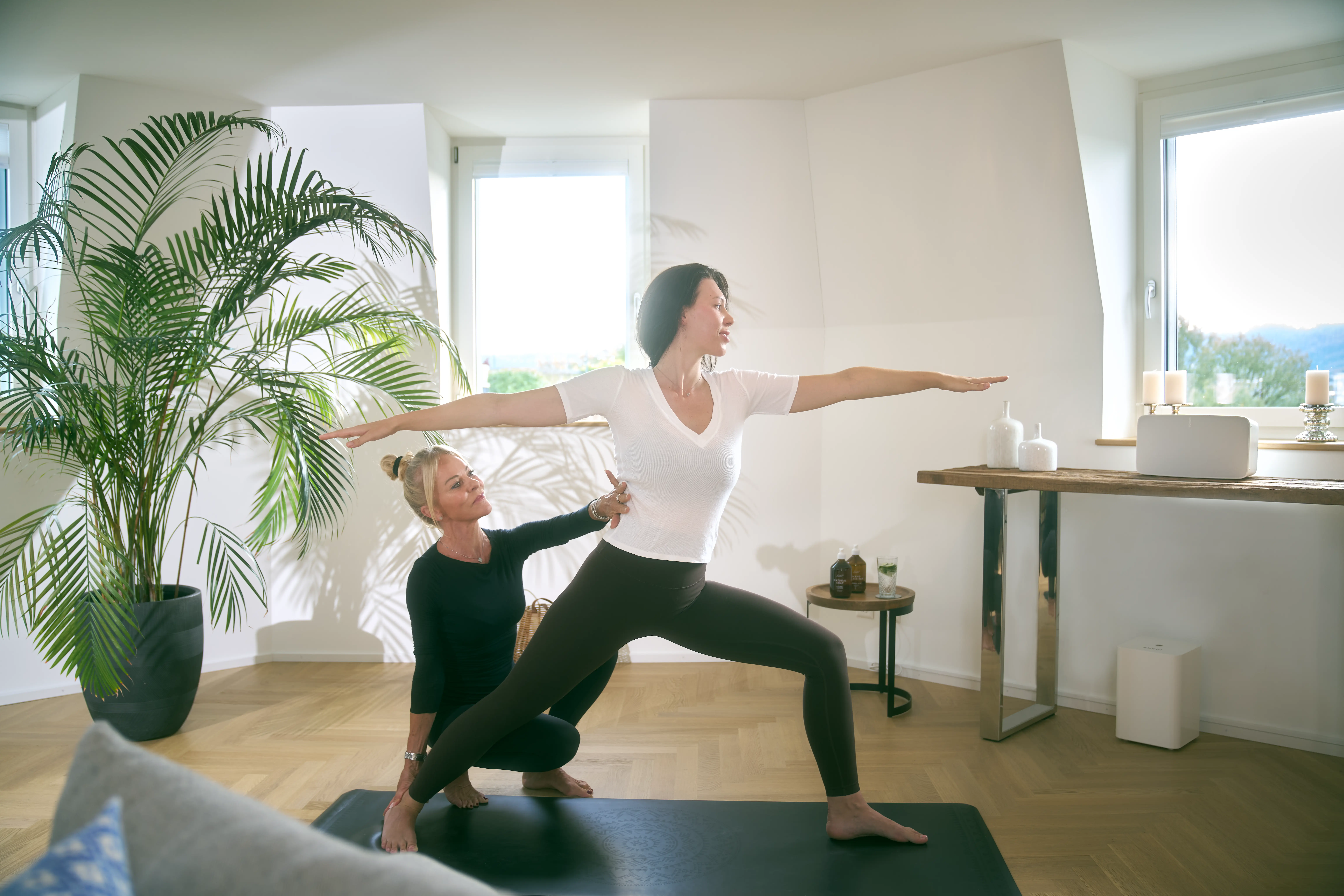 Woman practicing yoga therapy in a serene treatment setting at Paracelsus Recovery